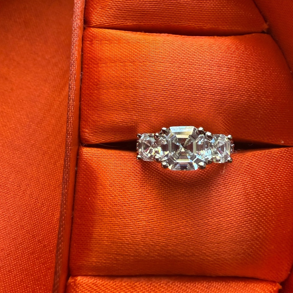 Elegant Silver  CZ  Women's Ring. Asscher cut stones.